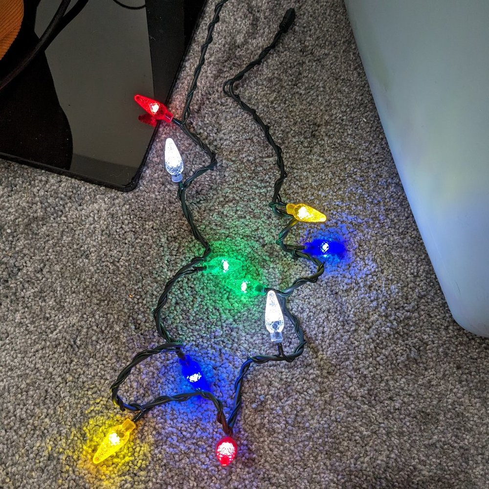 Nifty Holiday Cheer holiday lights phone charger for iPhone & ipad